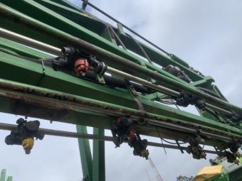 Обприскувач причіпний John Deere 624 foto 12